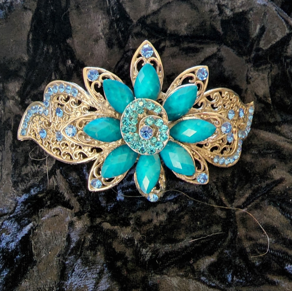 All metal blue and silver flower hair barrett